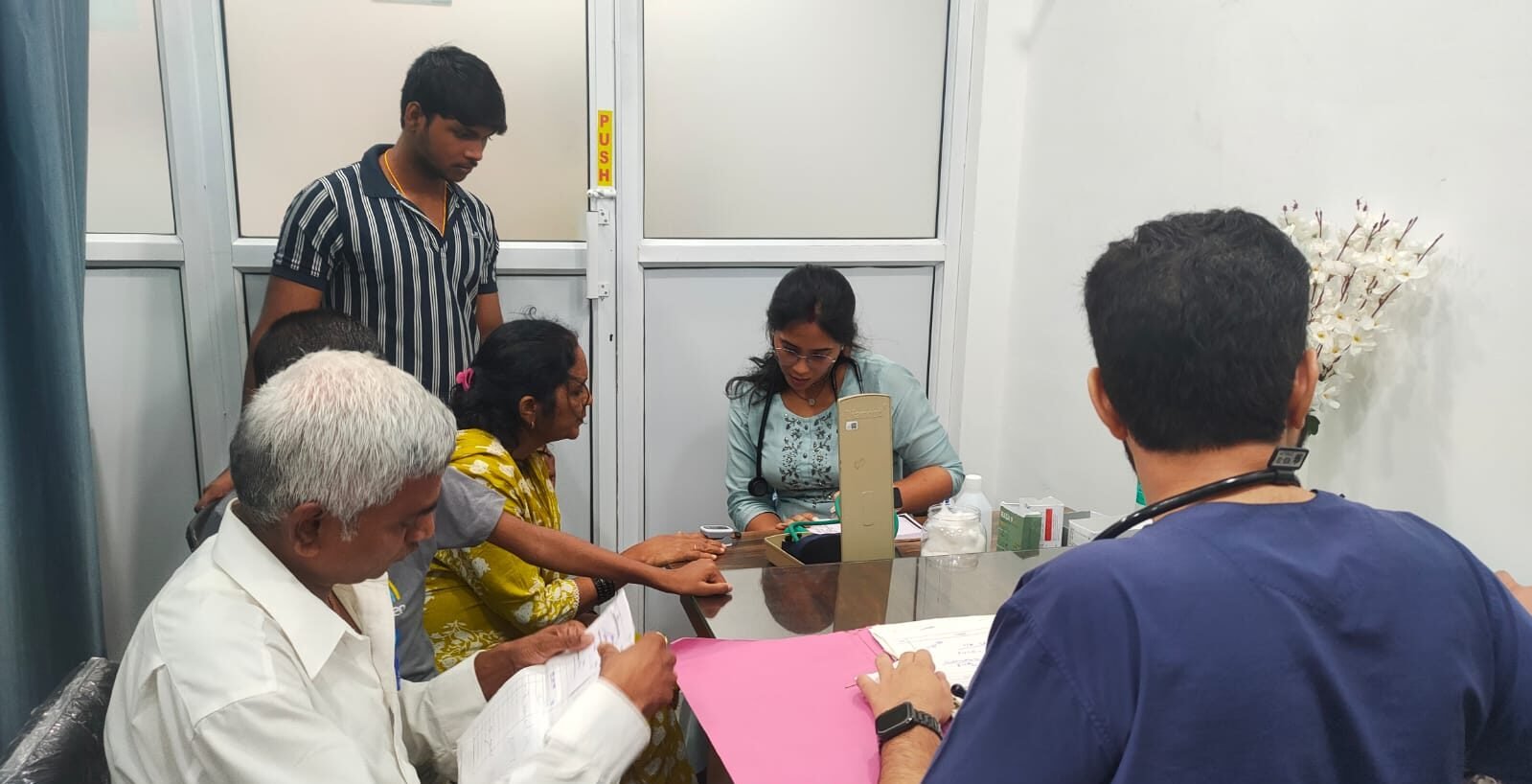 Community members attending a free Medical Checkup camp